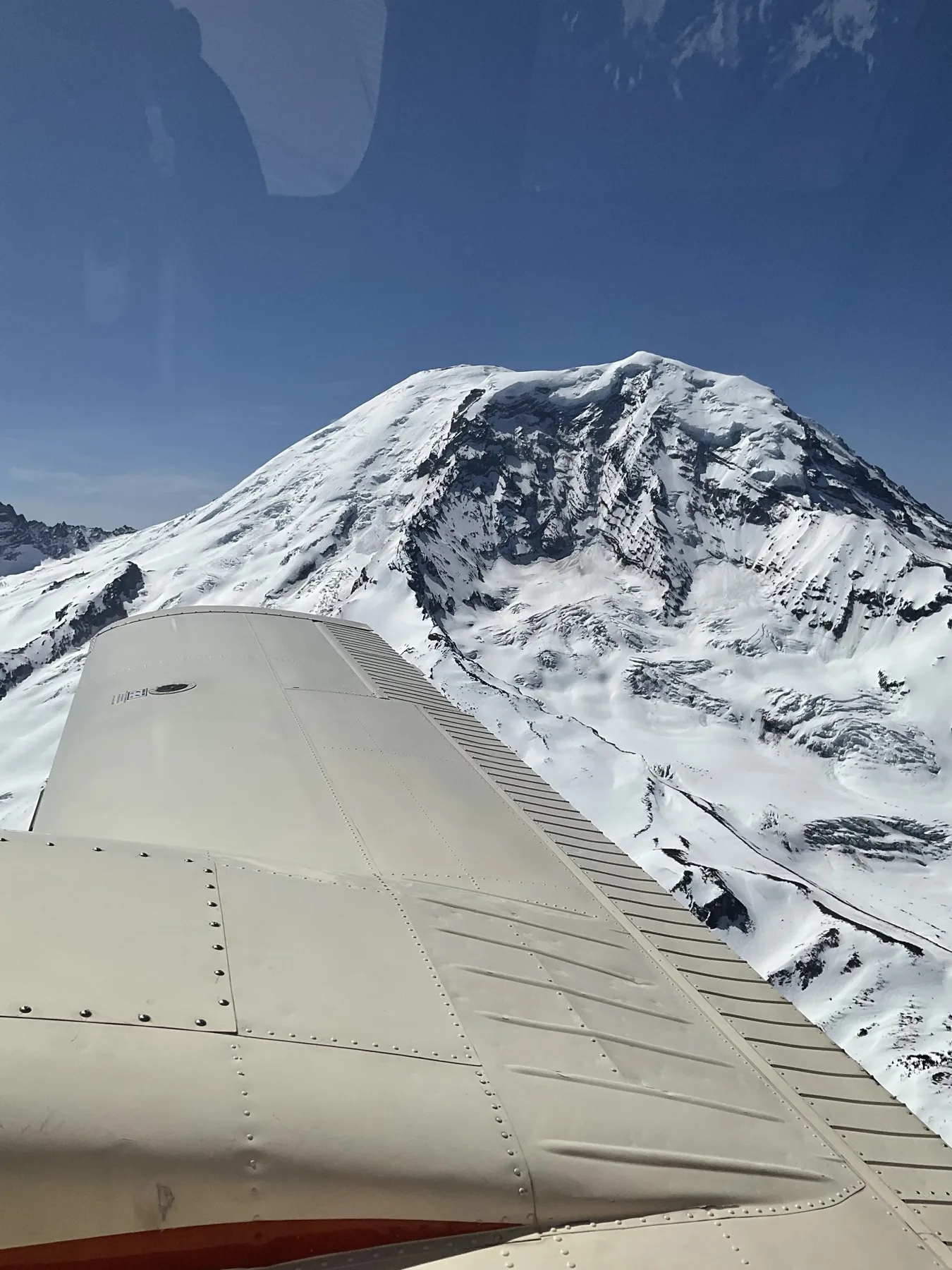 Mount Rainier shot from the cockpit of a BE-76 Duchess